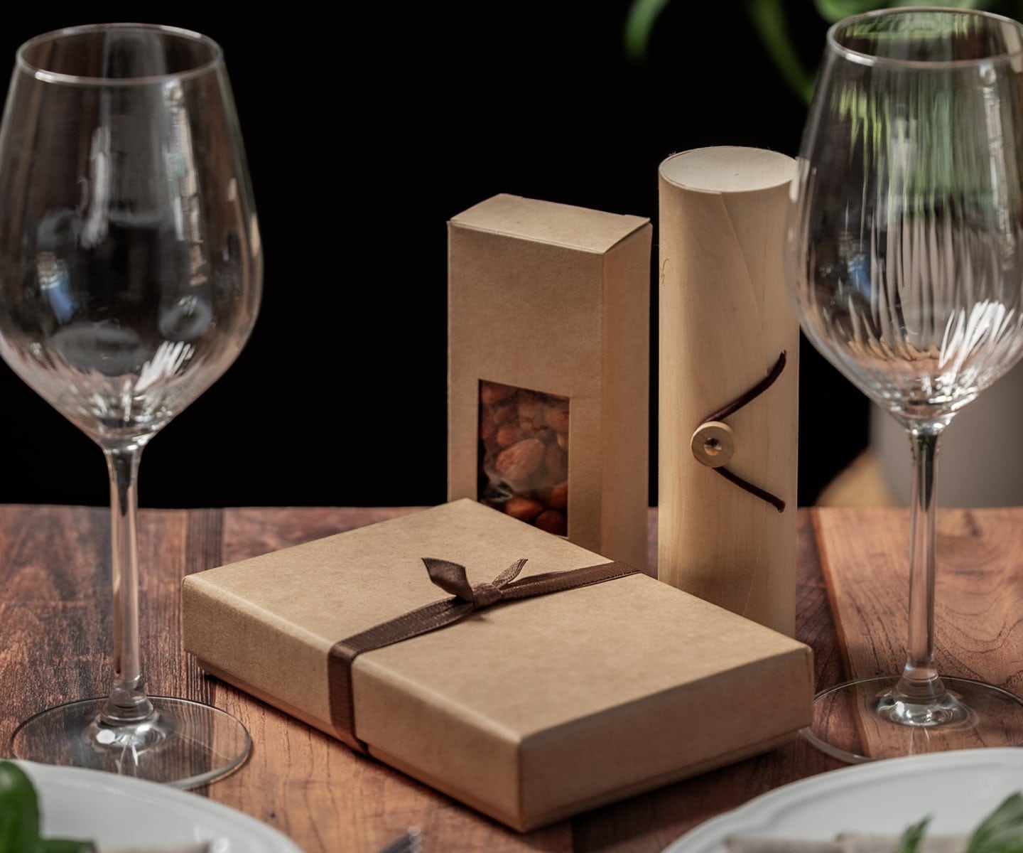 Business professional presenting a Torn Ranch gourmet gift box with truffles and nuts, symbolizing premium corporate gifting in 2025.