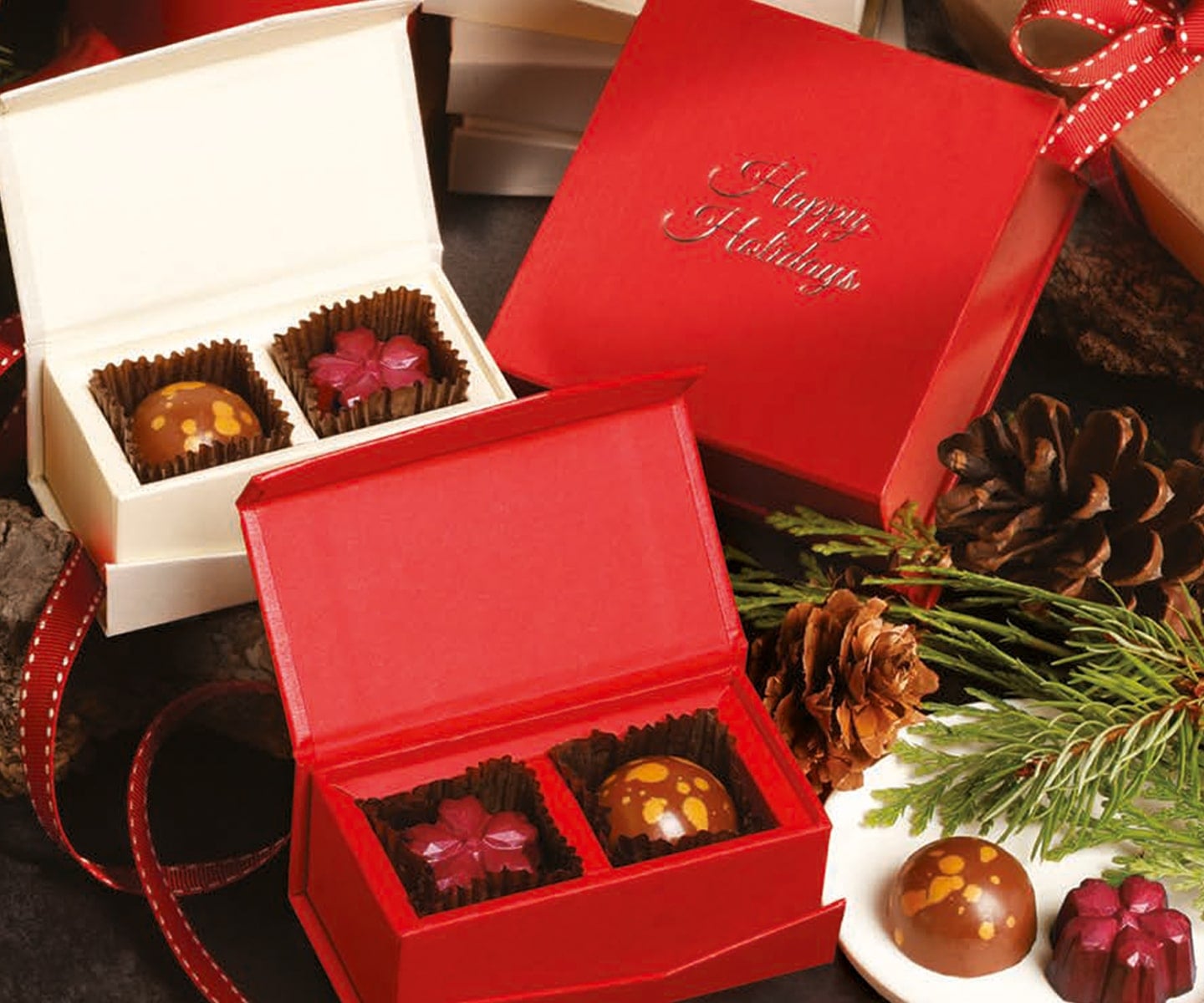 Elegant Torn Ranch gourmet gift tower with artisan chocolates, nuts, and truffles from the 2025 luxury corporate gifting collection.