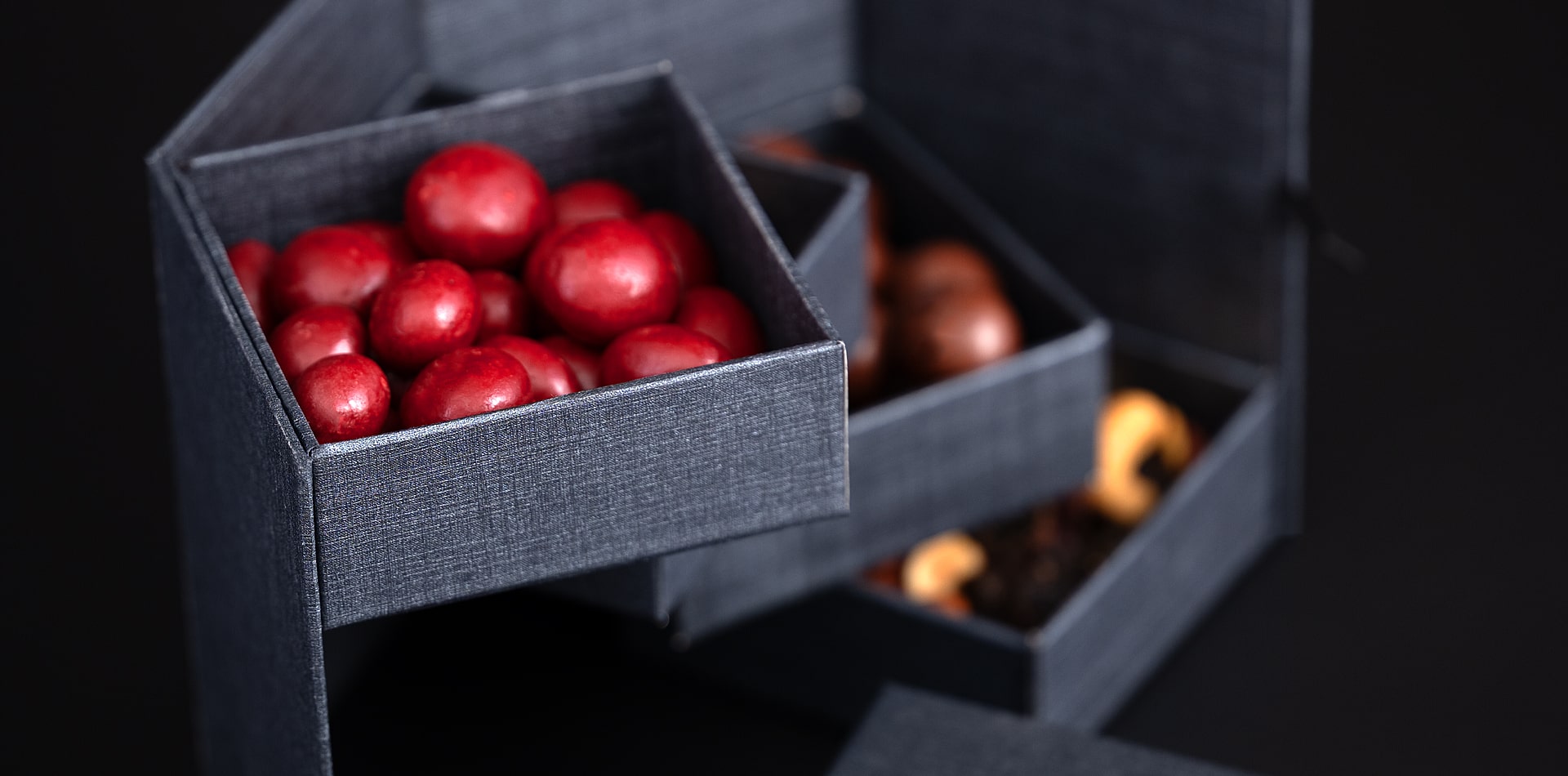 Torn Ranch 4-Tier Cascade box, linen graphite luxury color, premium amenity.