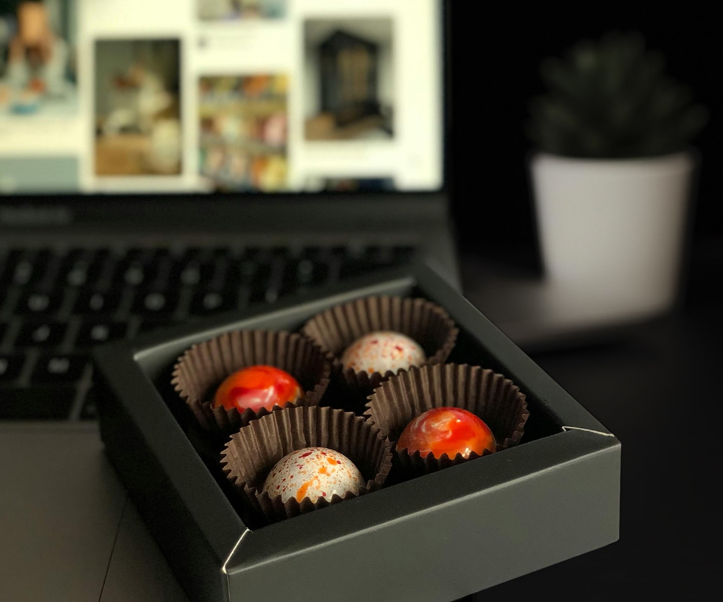Employee receiving a small Torn Ranch gourmet gift box, representing the impact of under-$10 appreciation gifts.