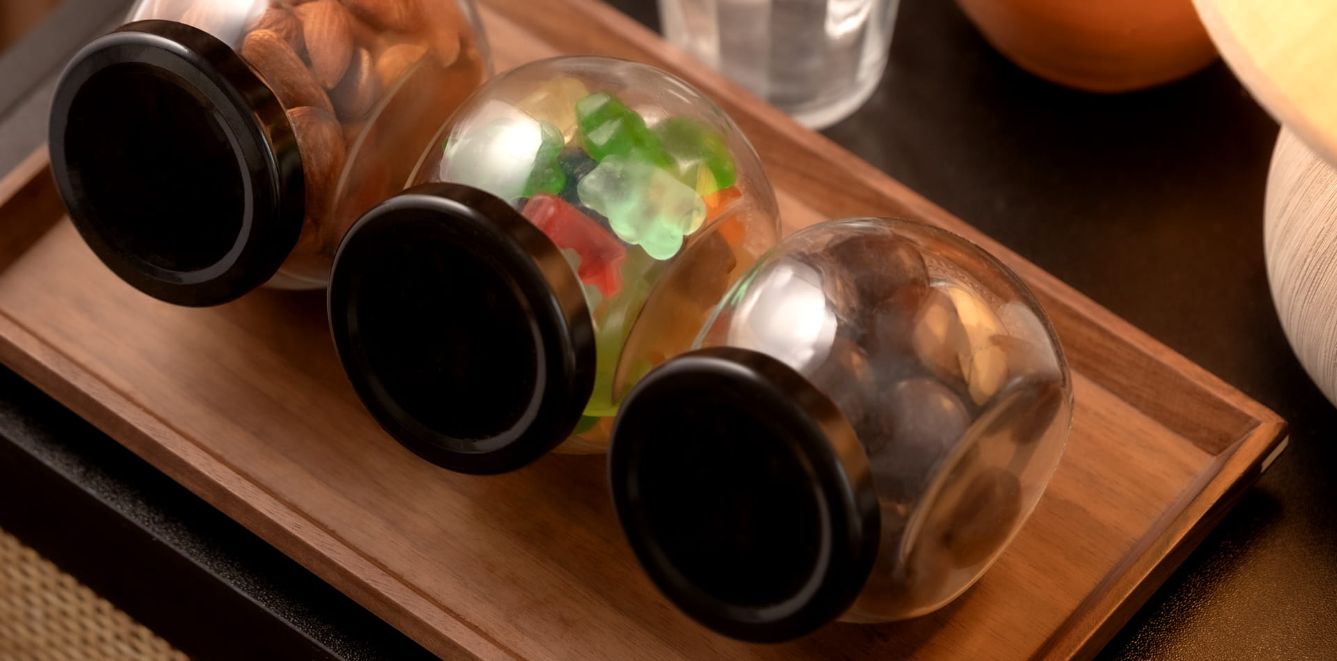 Comparison of premium curated minibar versus mass-market options showing the impact of presentation and quality.